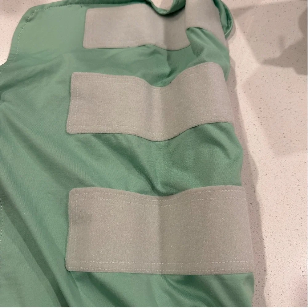 The Ollie Swaddle Adjustable Infant Sleep Sack‎ Mint Green Wrap One Size